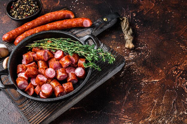 Sliced Hot Smoked sausages with aromatic herbs and spices