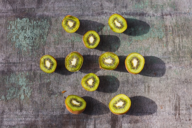 Sliced Kiwi Fruit on a gray vintage table