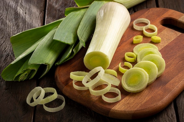 Sliced leek on wooden table