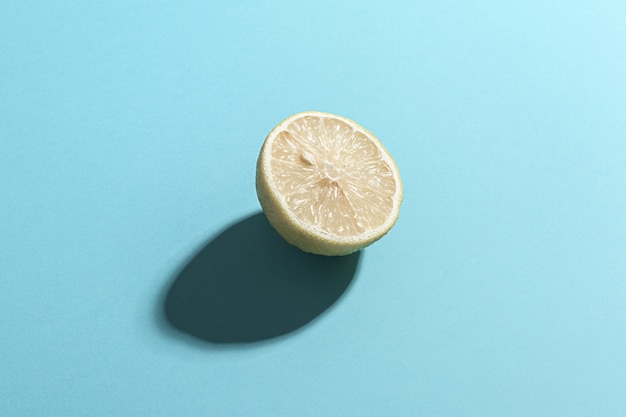 Sliced lemon on a blue background