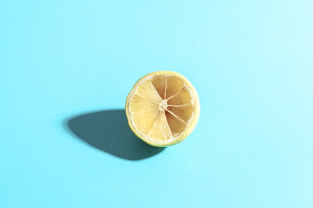 Sliced lemon on a blue background