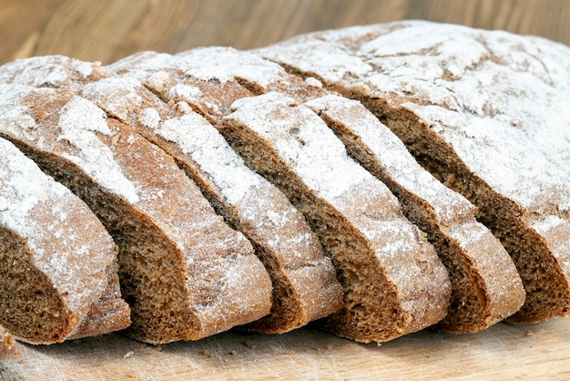 Sliced loaf of fresh soft bread on the table