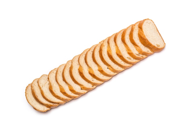 Sliced loaf of wheat bread on white background