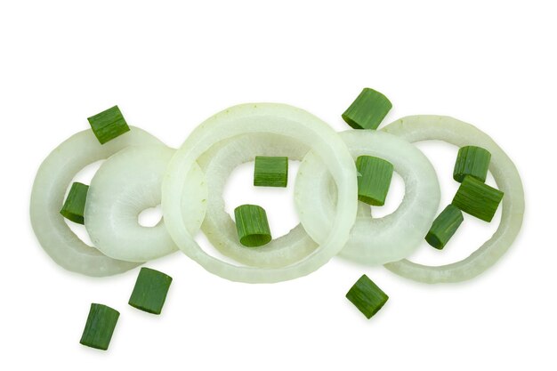 Sliced onion rings and scattered chaotically chopped green onions on a white background