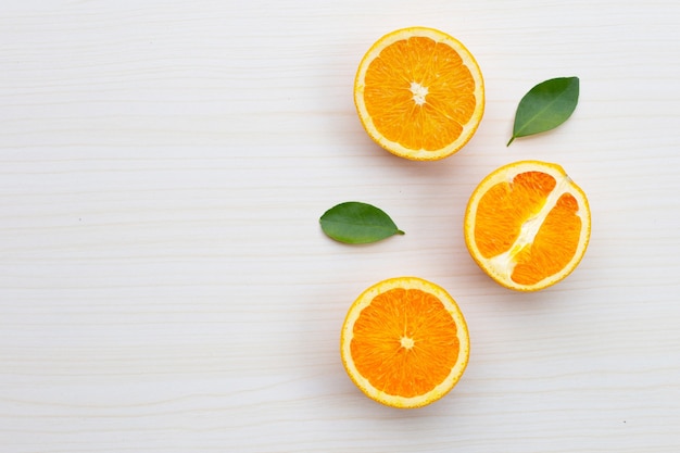 Sliced oranges on table wall. High vitamin C, Juicy and sweet.