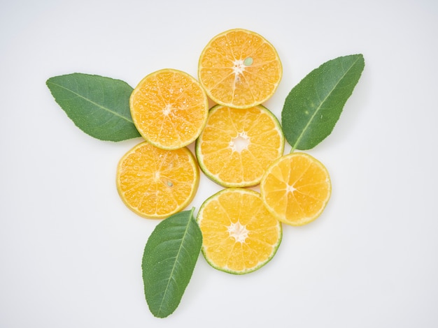 Sliced oranges on a white background