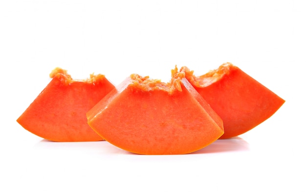 Sliced papaya on a white 