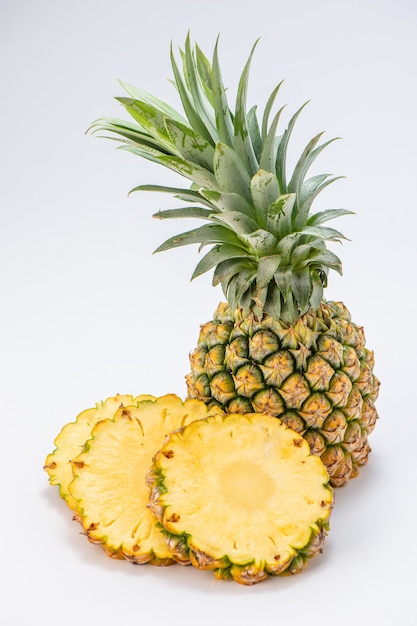 Sliced pineapple isolated on white background