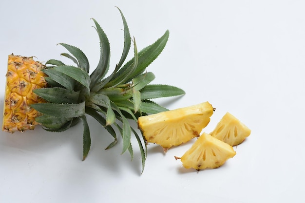 sliced pineapple on white background