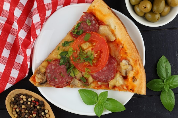 Sliced pizza on the table in the restaurant