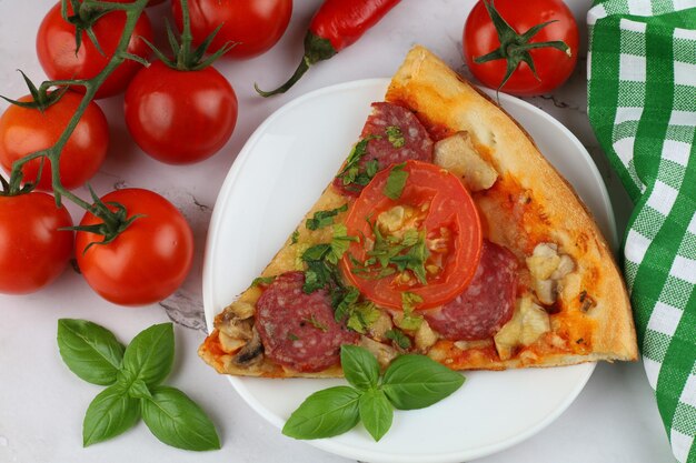 Sliced pizza on the table in the restaurant