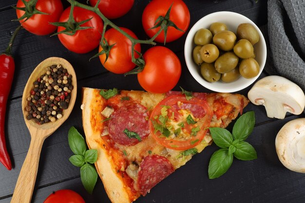 Sliced pizza with vegetables Pizza on the table