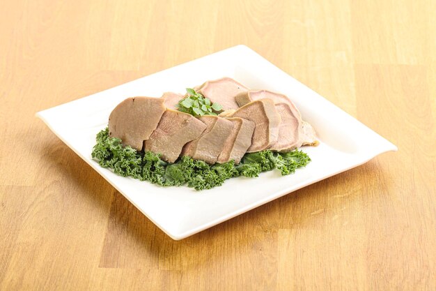 Sliced Pork Tongue snack appetizer served basil