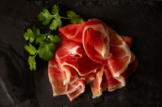 Sliced prosciutto parma italian delicacy top view horizontal no people