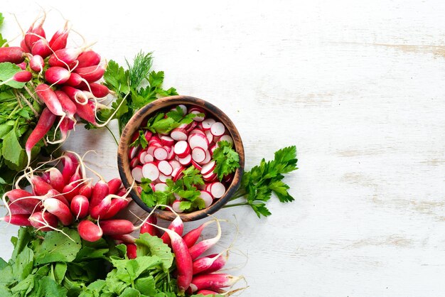 Sliced radishes on a Wooden Table Fresh vegetables Top view Free space for text