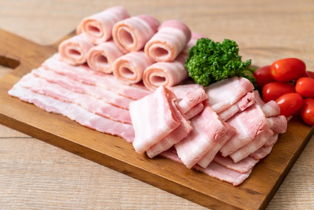 sliced raw pork bacon