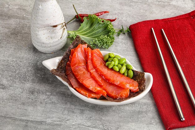 Sliced raw salmon sashimi in the plate