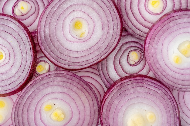 Sliced red onions texture. Food background, directly above