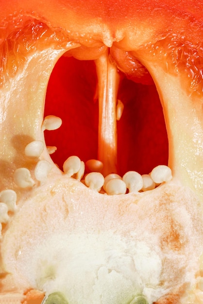 Фото Нарезанный красный перец крупного плана ядро красного перца