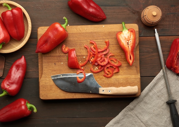 Sliced red pepper on a wooden board