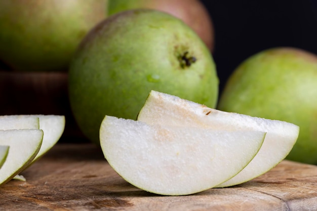 Sliced ripe green pear close up