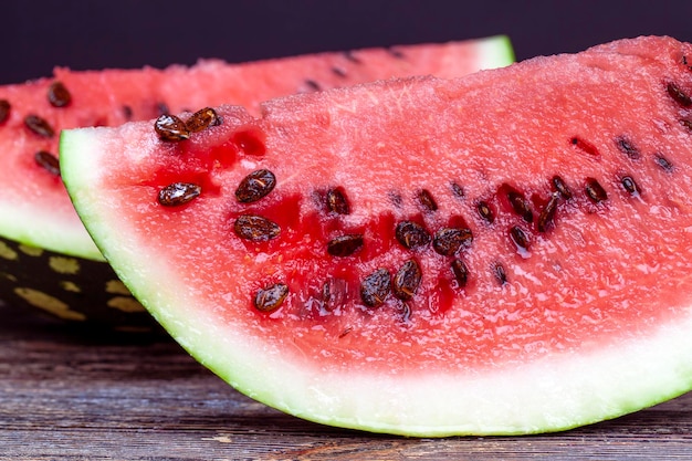 Sliced ripe red watermelon with lots of seeds