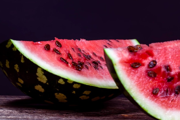 Sliced ripe red watermelon with lots of seeds