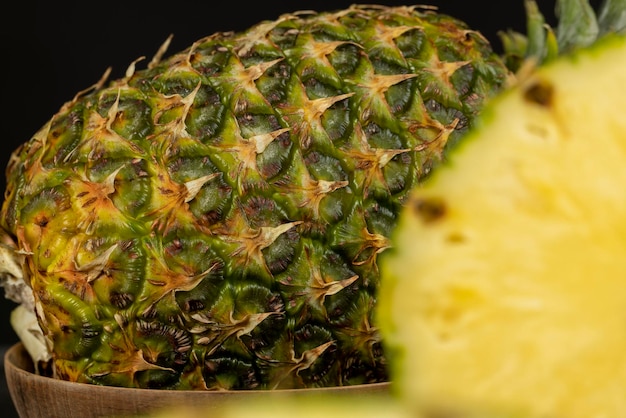 sliced ripe yellow pineapple a large number of pieces of ripe pineapple sliced into pieces during cooking closeup