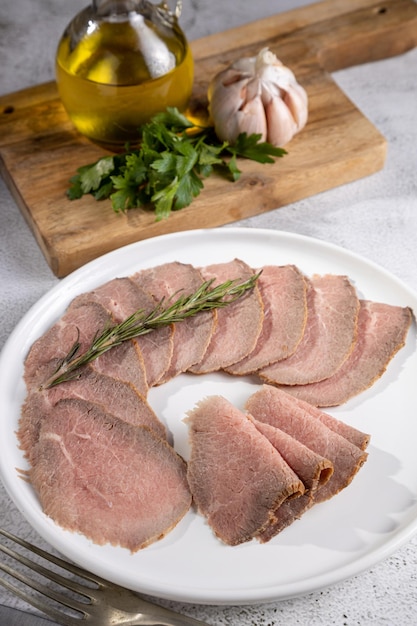 Sliced roast beef on plate