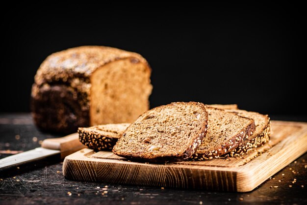 Sliced rye bread on a cutting board