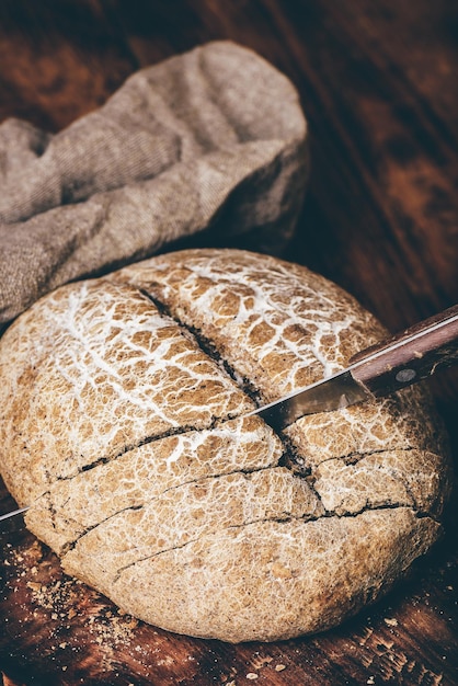 Sliced rye bread with knife