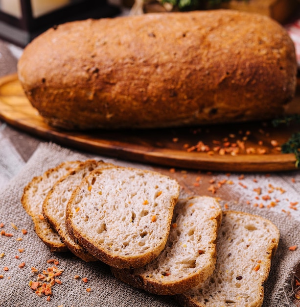 Sliced rye bread on a wooden table