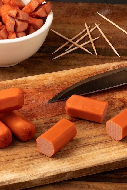 Sliced sausage on cutting board