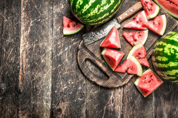 Sliced slices of ripe watermelon on a board