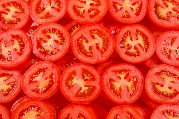 Sliced tomato background. Top view.