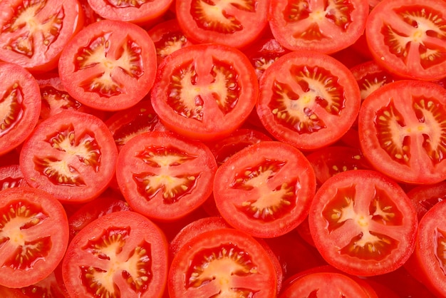 Sliced tomatoes background