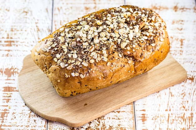 Photo sliced ​​vegan homemade bread, made with chestnuts, oats, lychee, grains and biological yeast, without milk