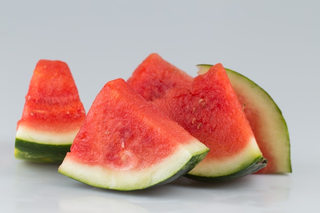 Sliced watermelon close up in  a gray surface