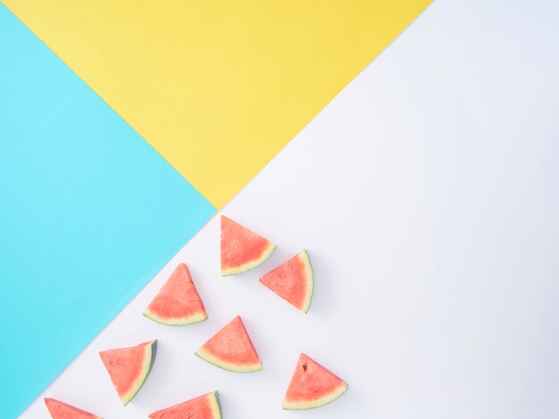 Sliced watermelon on color background.