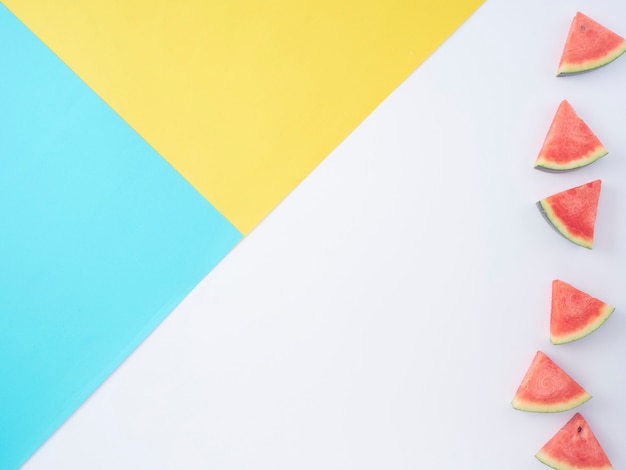 Sliced watermelon on color background.