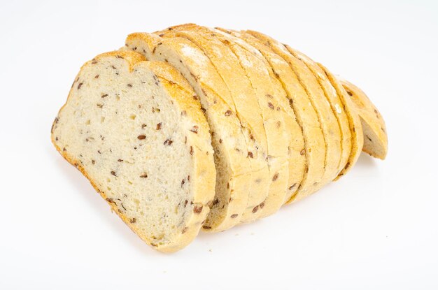 Sliced wheat bread with flax and caraway seeds. Studio Photo.