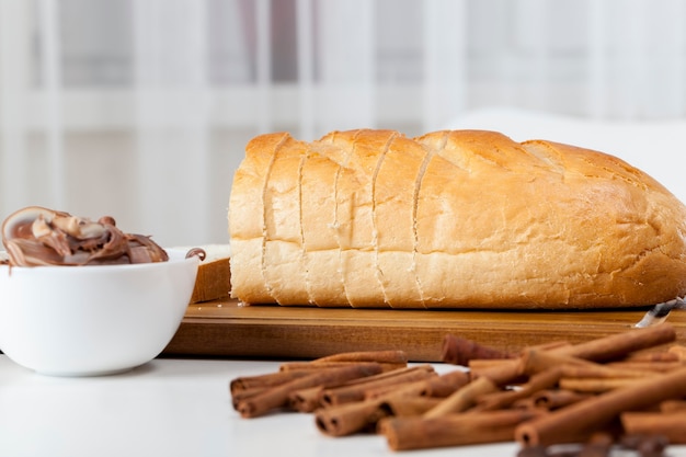 Sliced white loaf on table