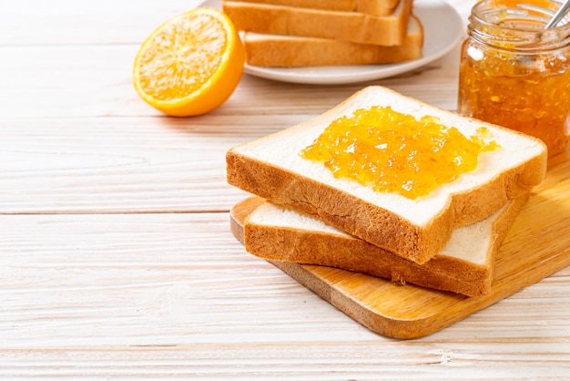 Slices of bread with orange jam