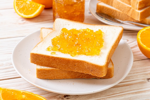 Slices of bread with orange jam