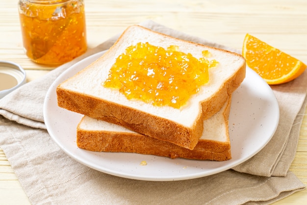 Slices of bread with orange jam