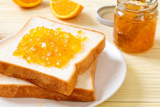 Slices of bread with orange jam