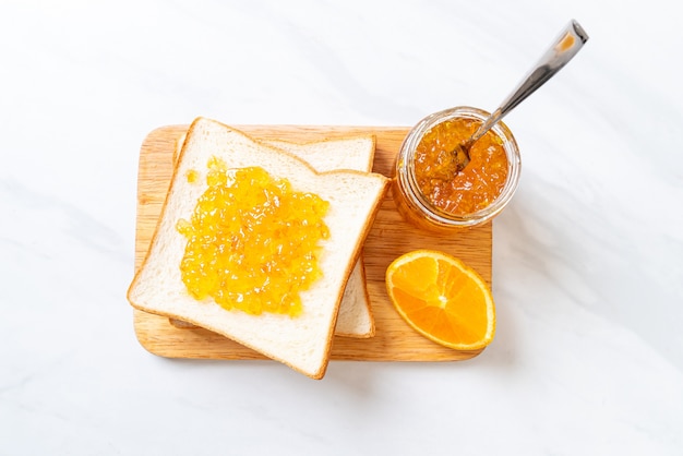 Slices of bread with orange jam