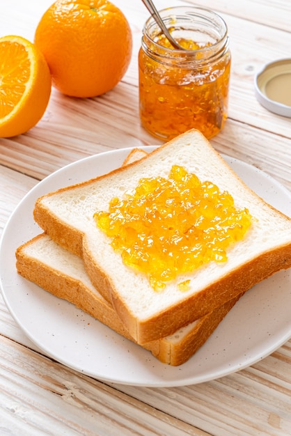 Slices of bread with orange jam