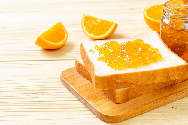 Slices of bread with orange jam