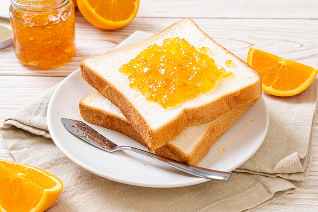 Slices of bread with orange jam